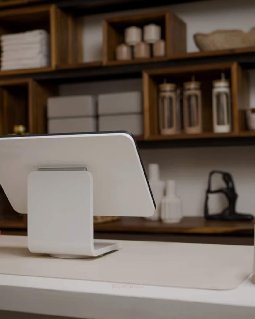 Modern payment terminal on the counter of a specialty coffee shop