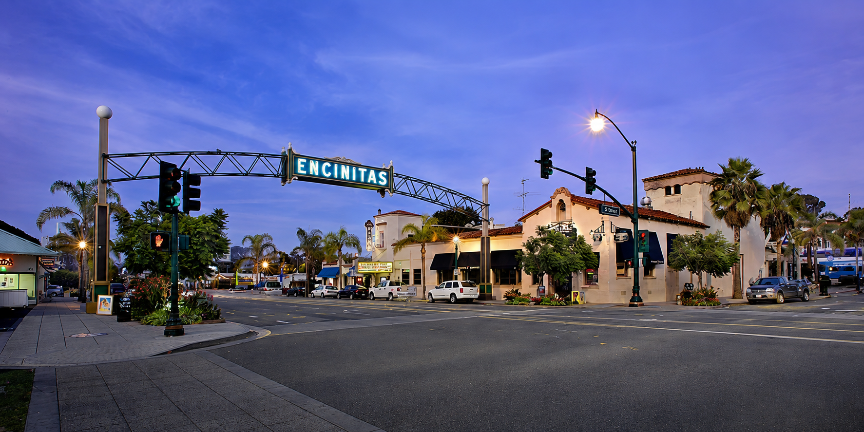 The Encinitas sign arch over Coast Highway 101 at dusk in North County San Diego